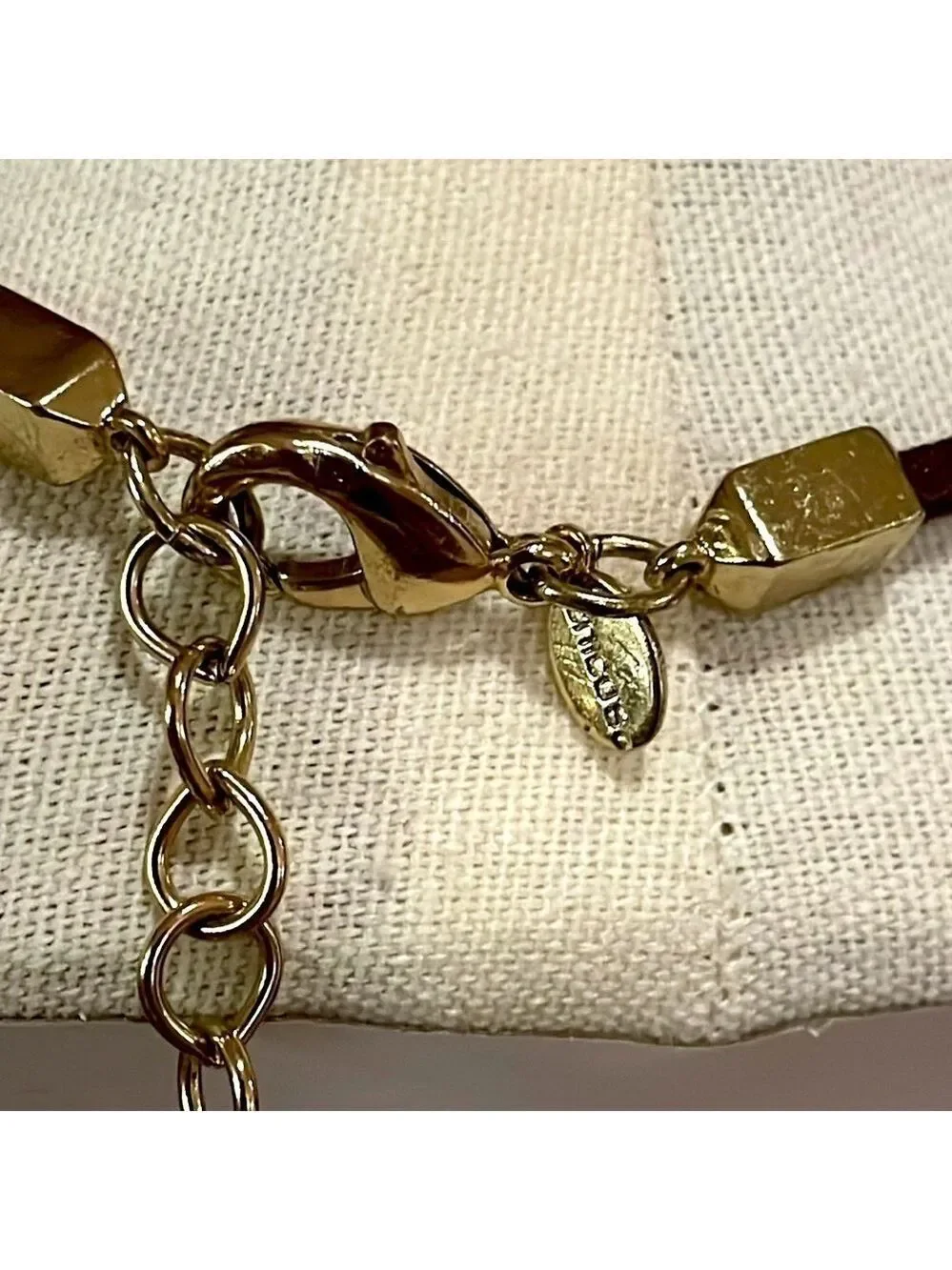 Chico’s leather long beaded necklace with gold and navy blue pendant